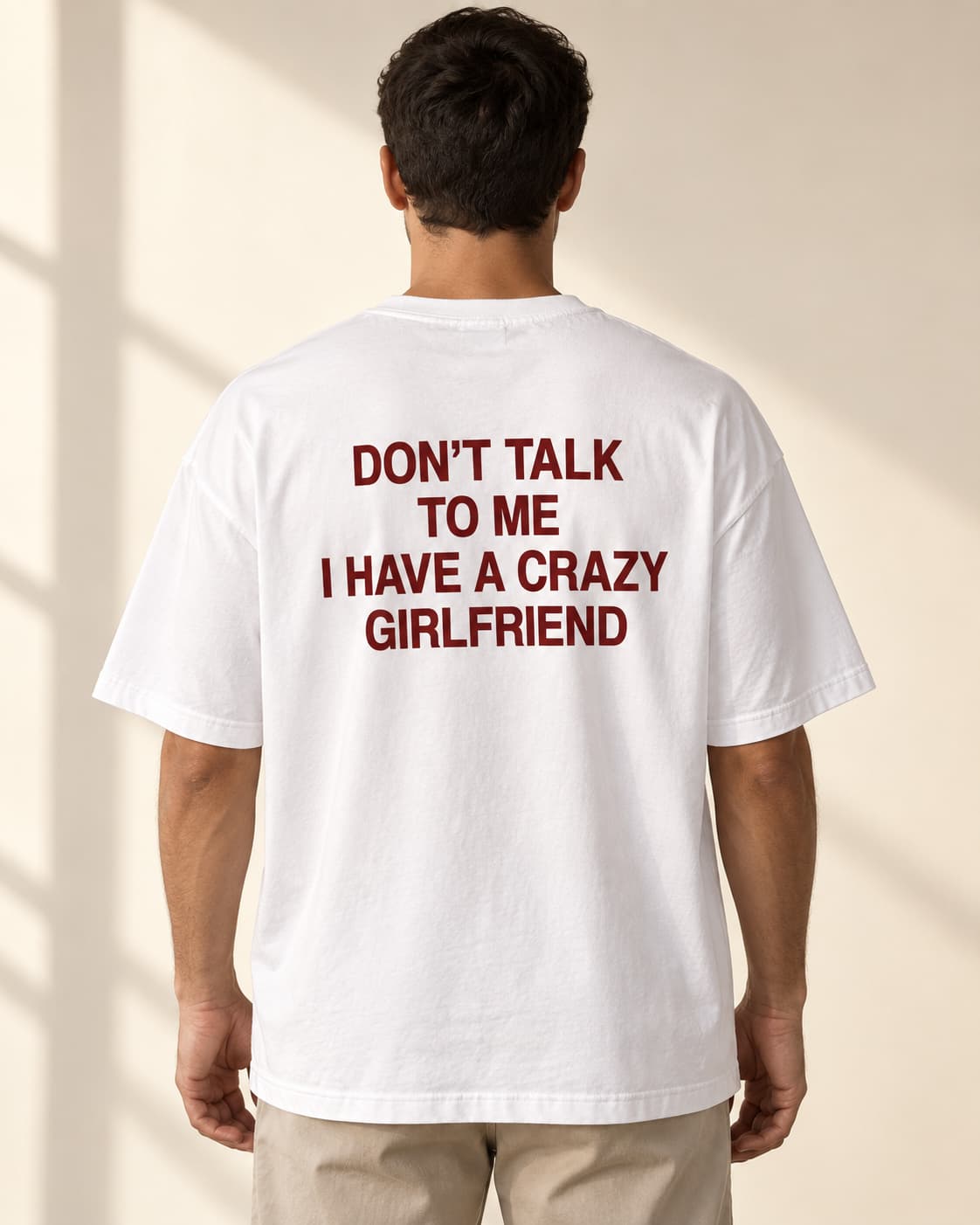 Oversized Tee in white. Caption reads: DON'T TALK TO ME I HAVE A CRAZY GIRLFRIEND