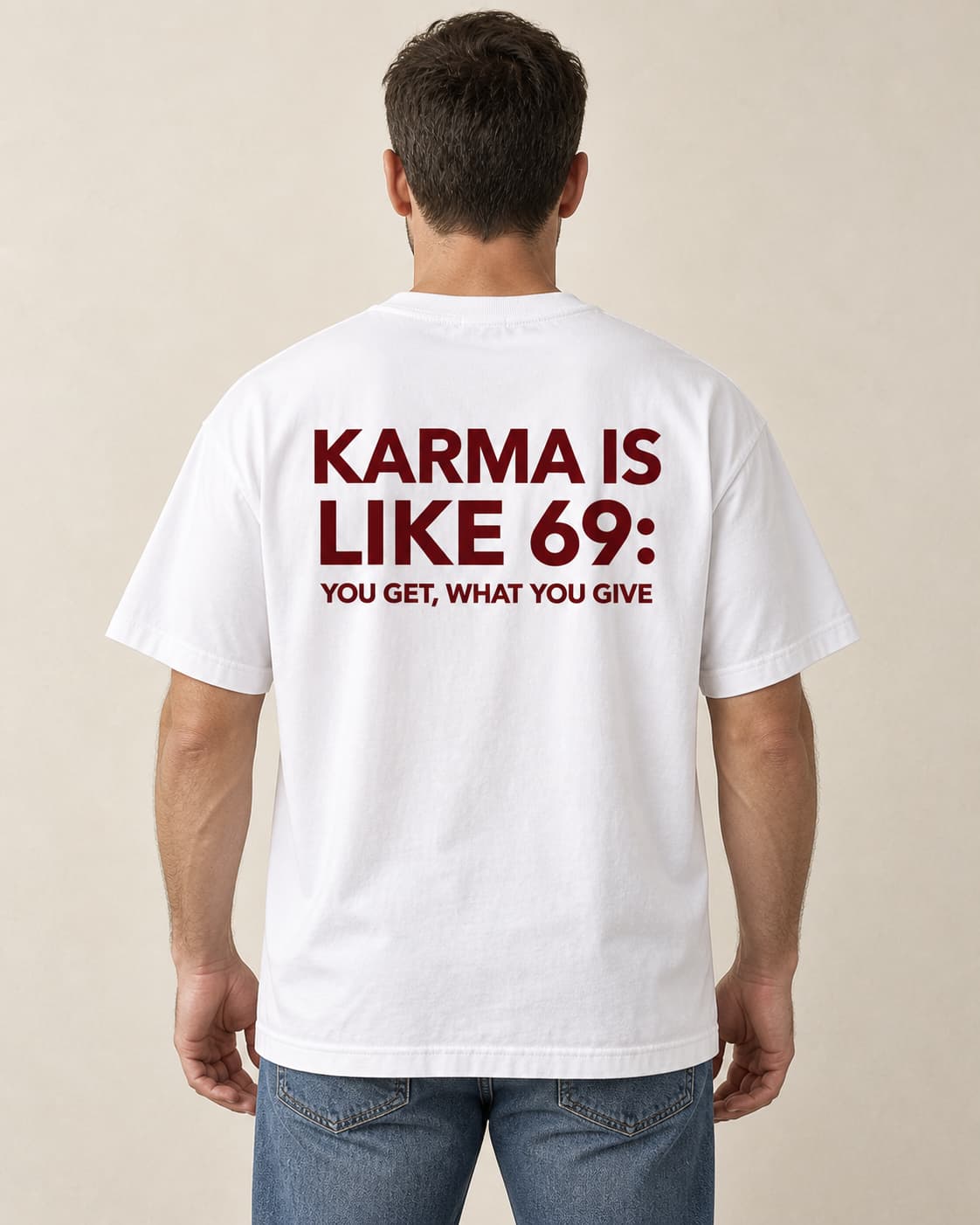 Oversized Tee in white. Caption reads: KARMA IS LIKE 69: YOU GET, WHAT YOU GIVE