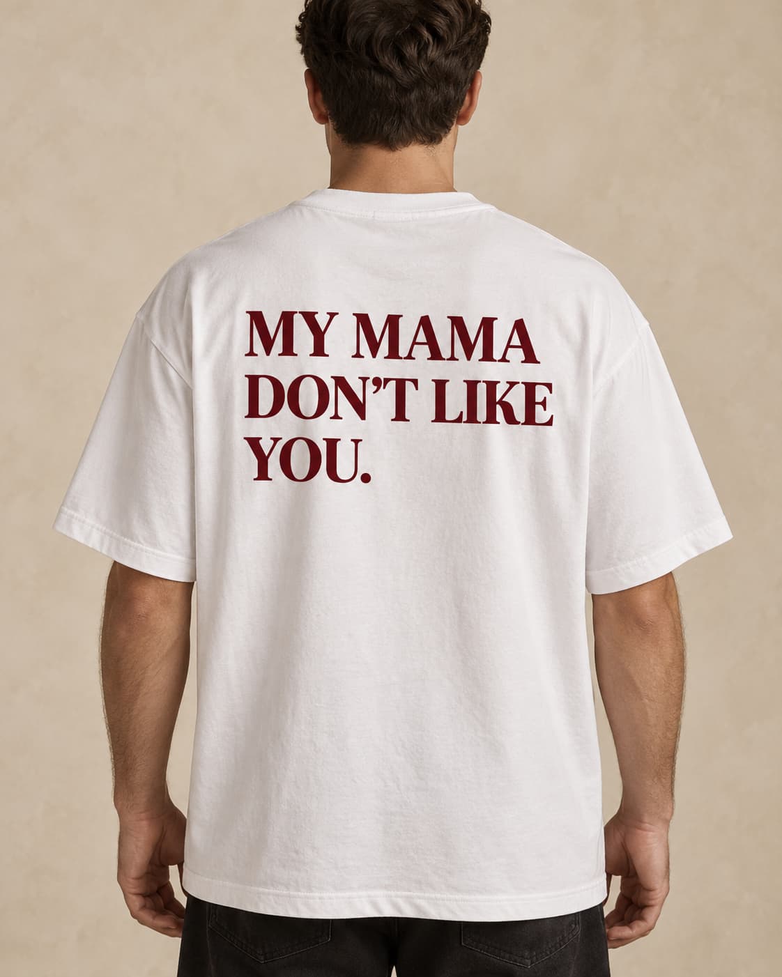 Oversized Tee in white. Caption reads: MY MAMA DON’T LIKE YOU.