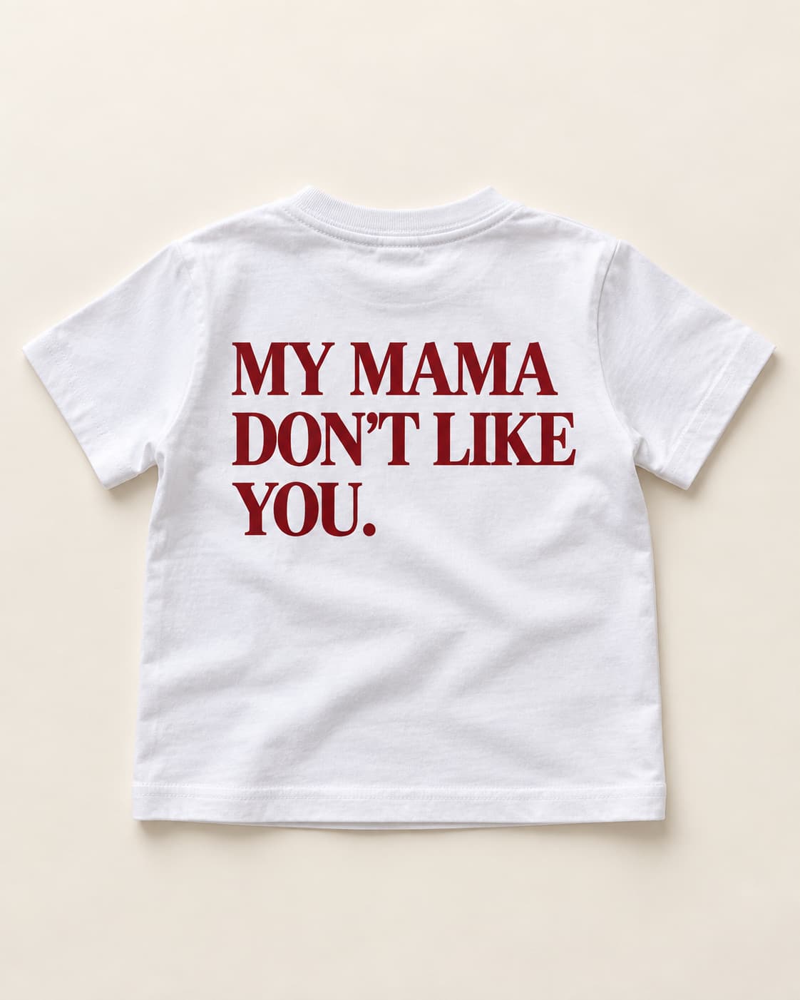 Kids Tee in white. Caption reads: MY MAMA DON'T LIKE YOU.