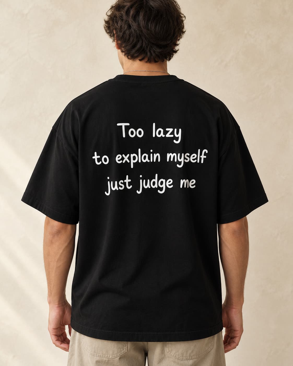 Oversized Tee in black. Caption reads: Too lazy to explain myself just judge me
